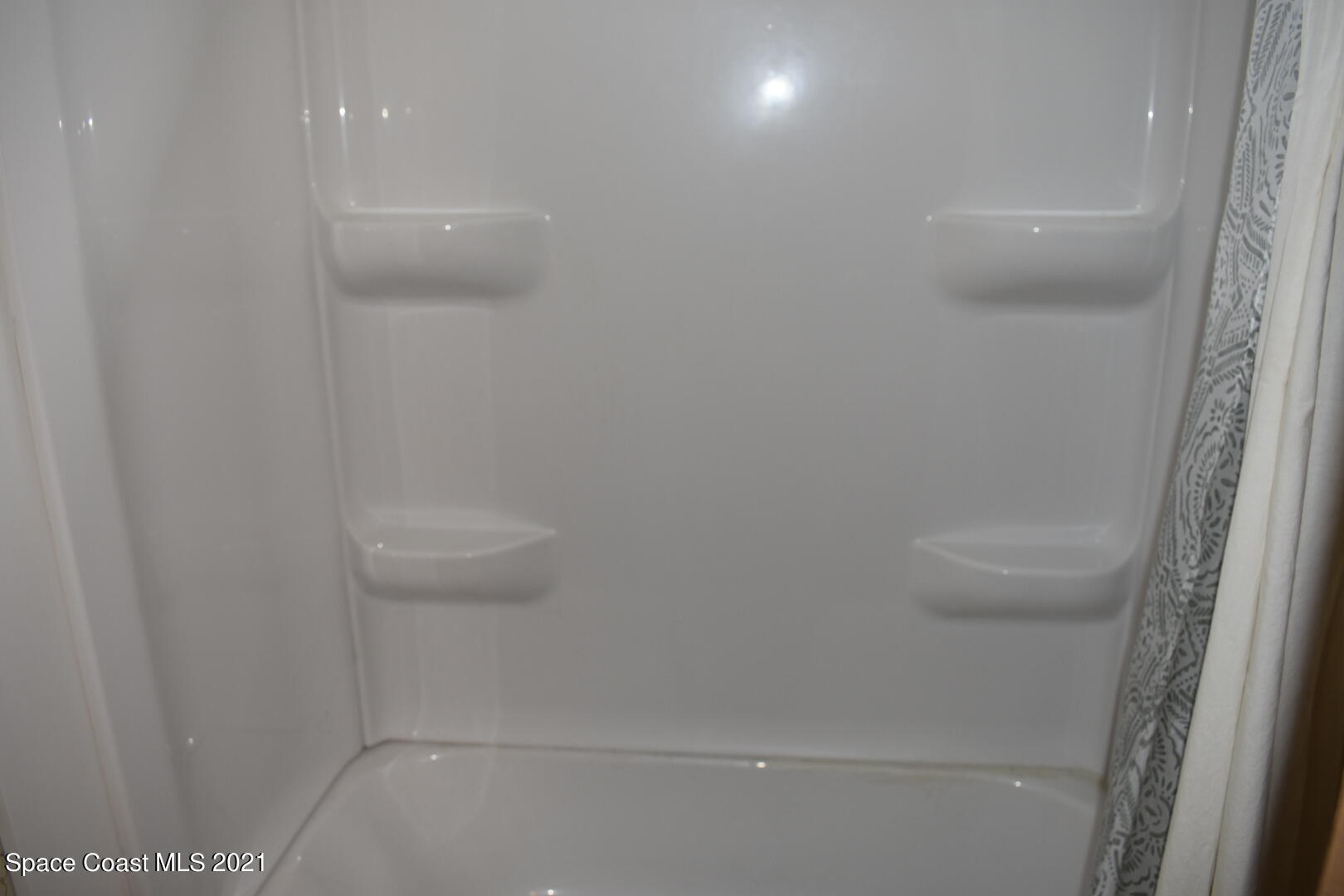 3315 Brockett Road Mims, FL 32754 - Photo 24 of 27 a bathroom with a shower