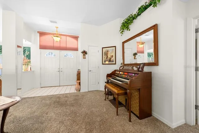 a view of a workspace with furniture