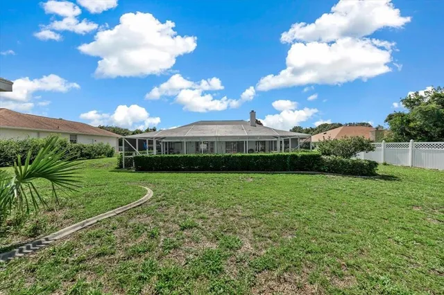 a view of a house with a big yard