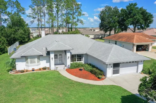 front view of a house with a yard