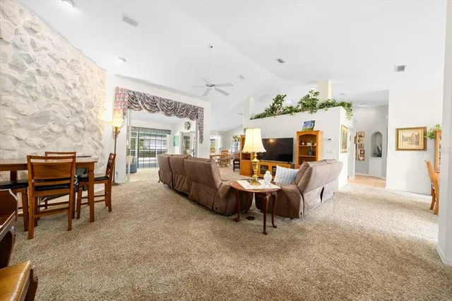 a living room with furniture and a table