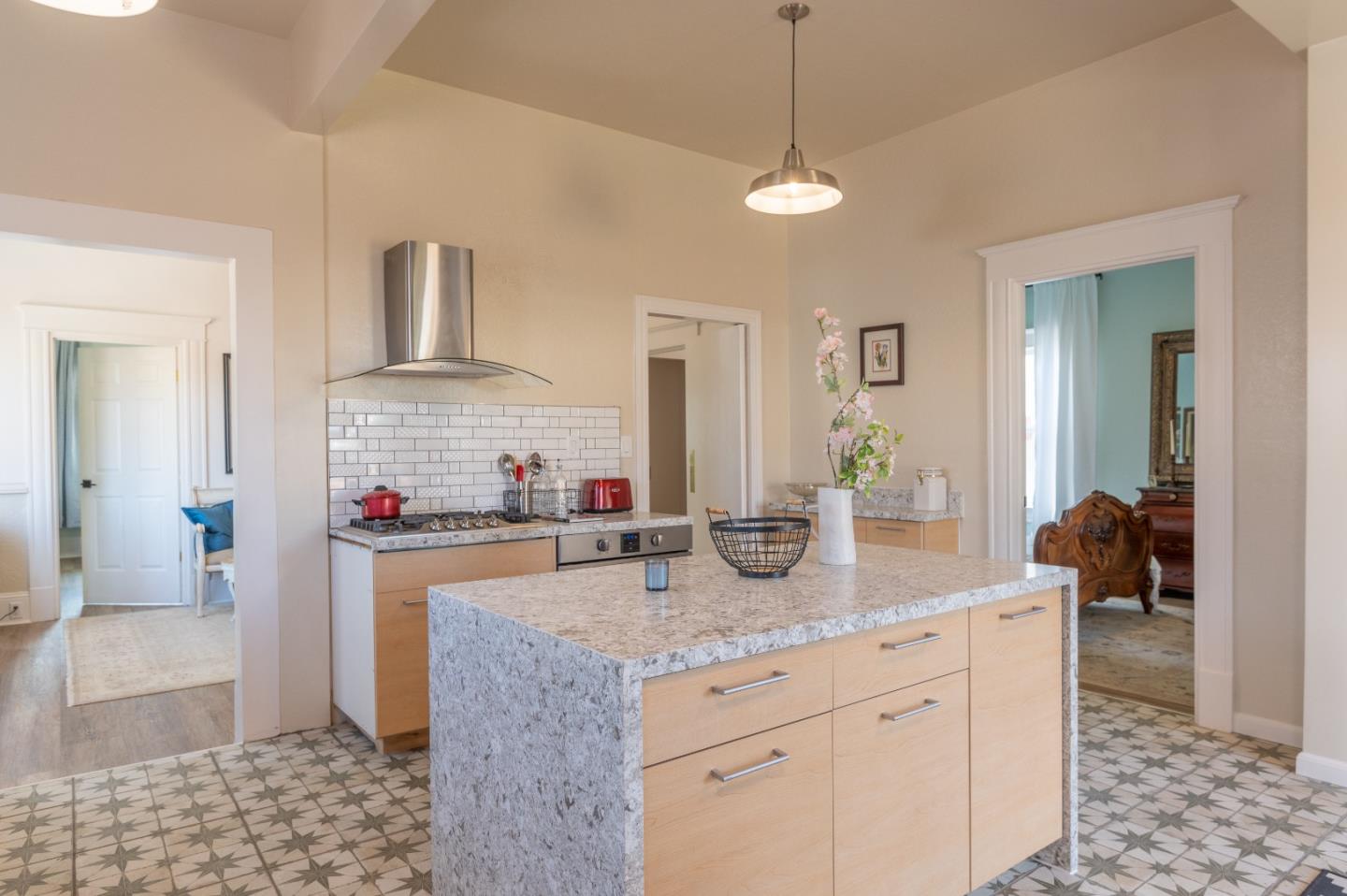 416 Front Street Salinas, CA 93901 - Photo 28 of 48 a kitchen with stainless steel appliances granite countertop a sink and a refrigerator
