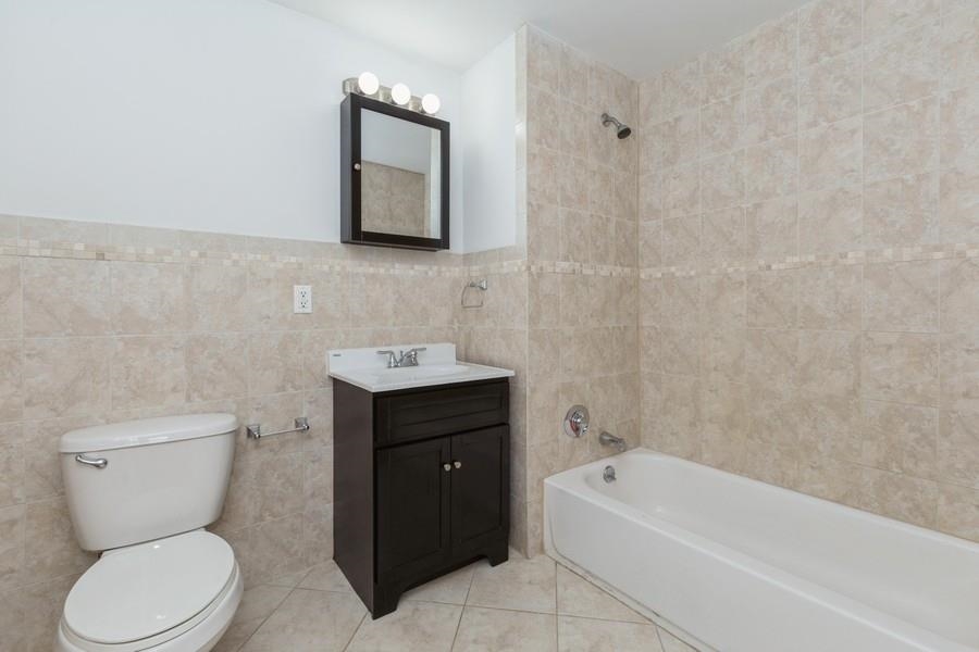 125 43rd Street, Unit 504 Union City, NJ 07087 - Photo 12 of 16 a bathroom with a toilet sink and bathtub