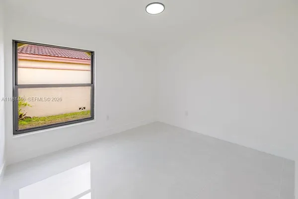 an empty room with a window