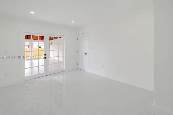 an empty room with windows