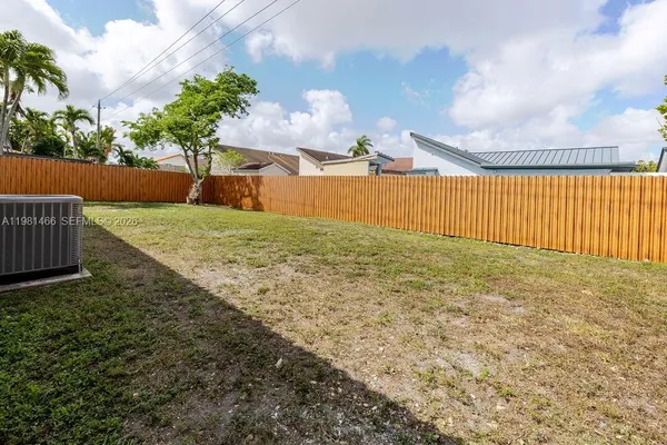 a house with garden in front of it