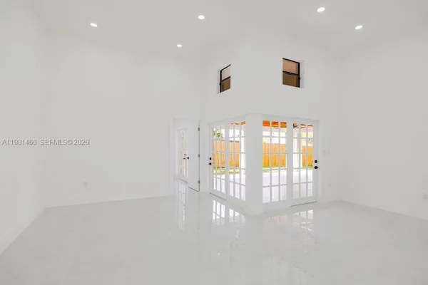 an empty room with windows