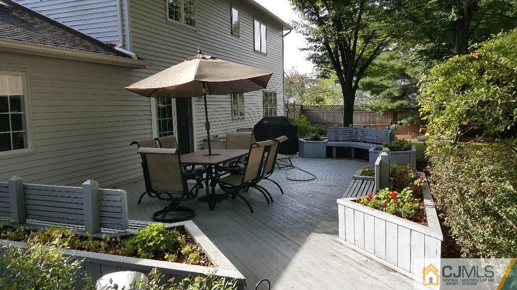 53 Higgins Road Old Bridge, NJ 08857 - Photo 13 of 17 a view of a chairs and table in the patio