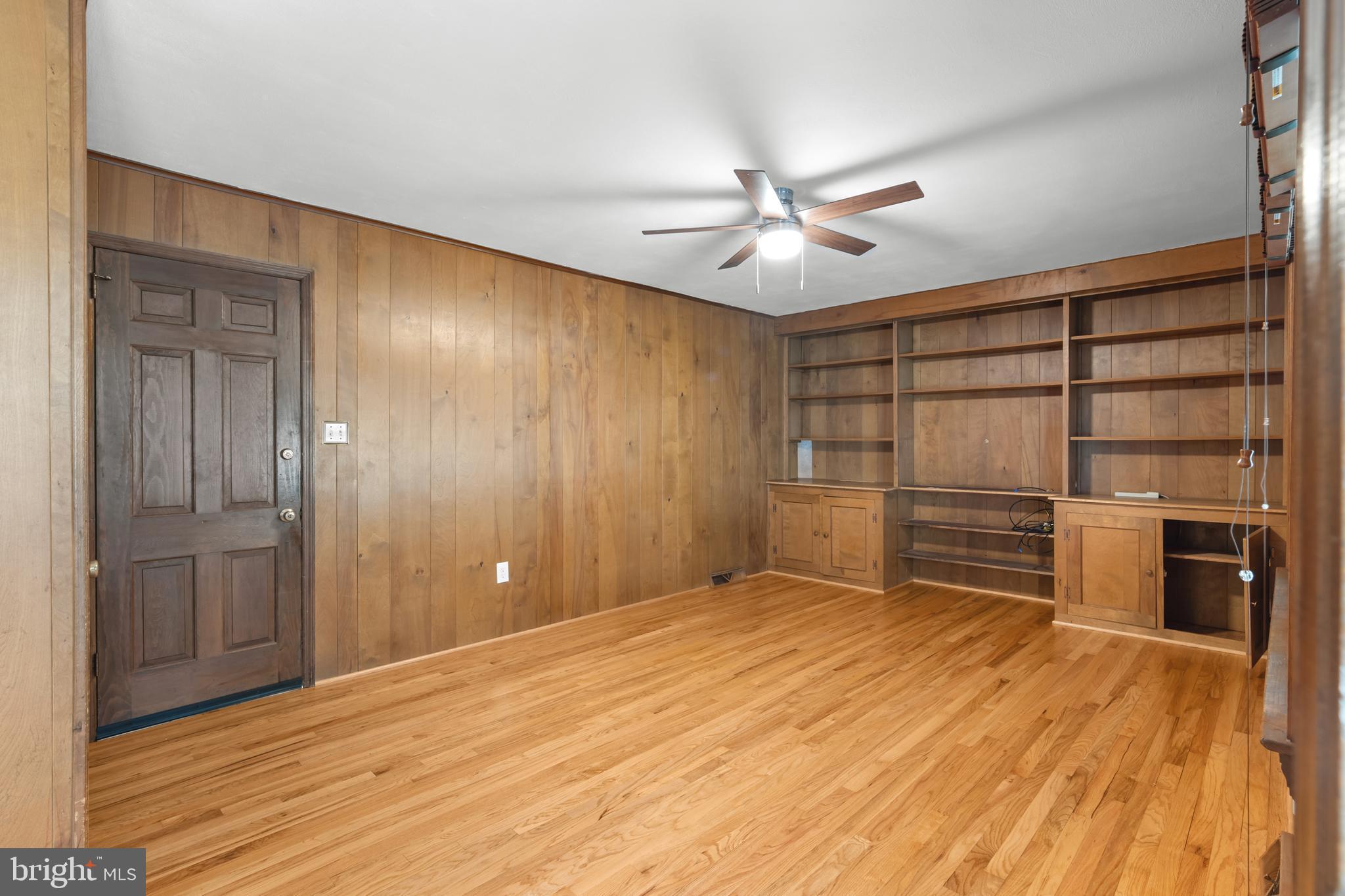 10 Cohee Circle Wilmington, DE 19803 - Photo 14 of 30 a view of empty room with a fireplace and cabinet