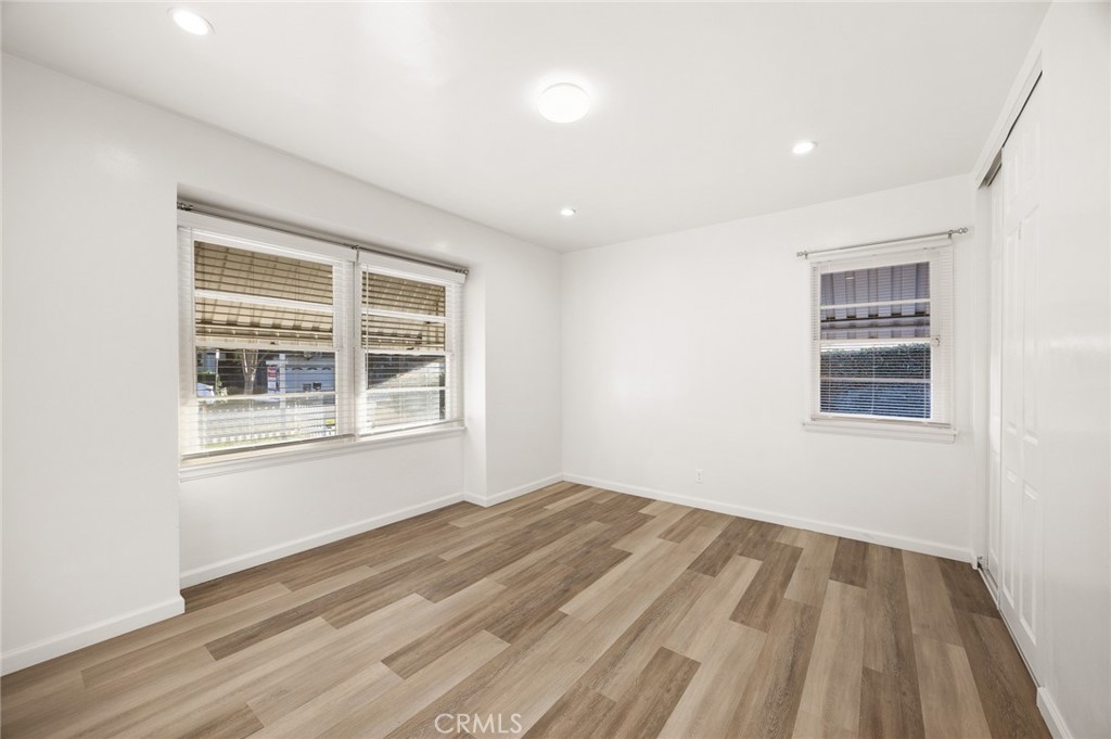 141 Fano Street Arcadia, CA 91006 - Photo 10 of 22 a view of empty room with wooden floor and fan