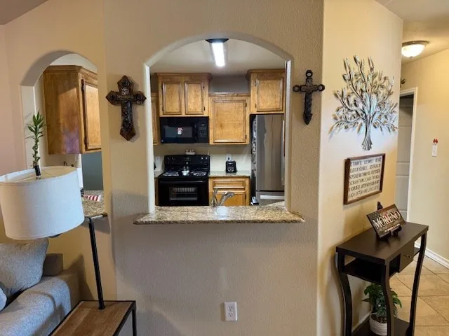 a view of living room and kitchen