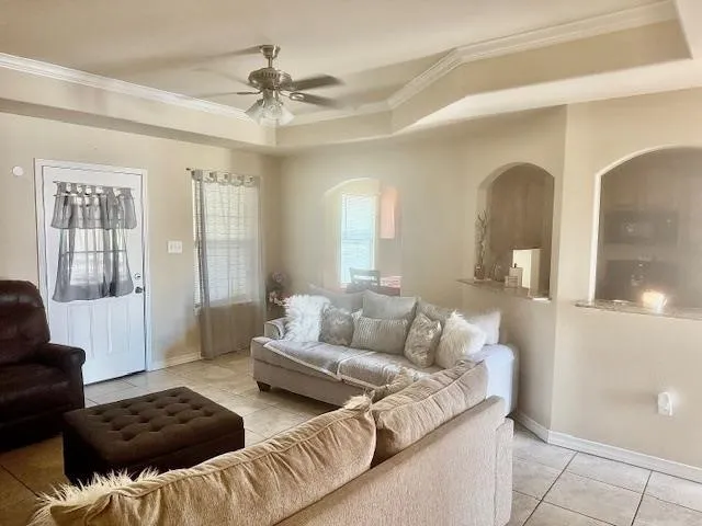 a living room with furniture and a window