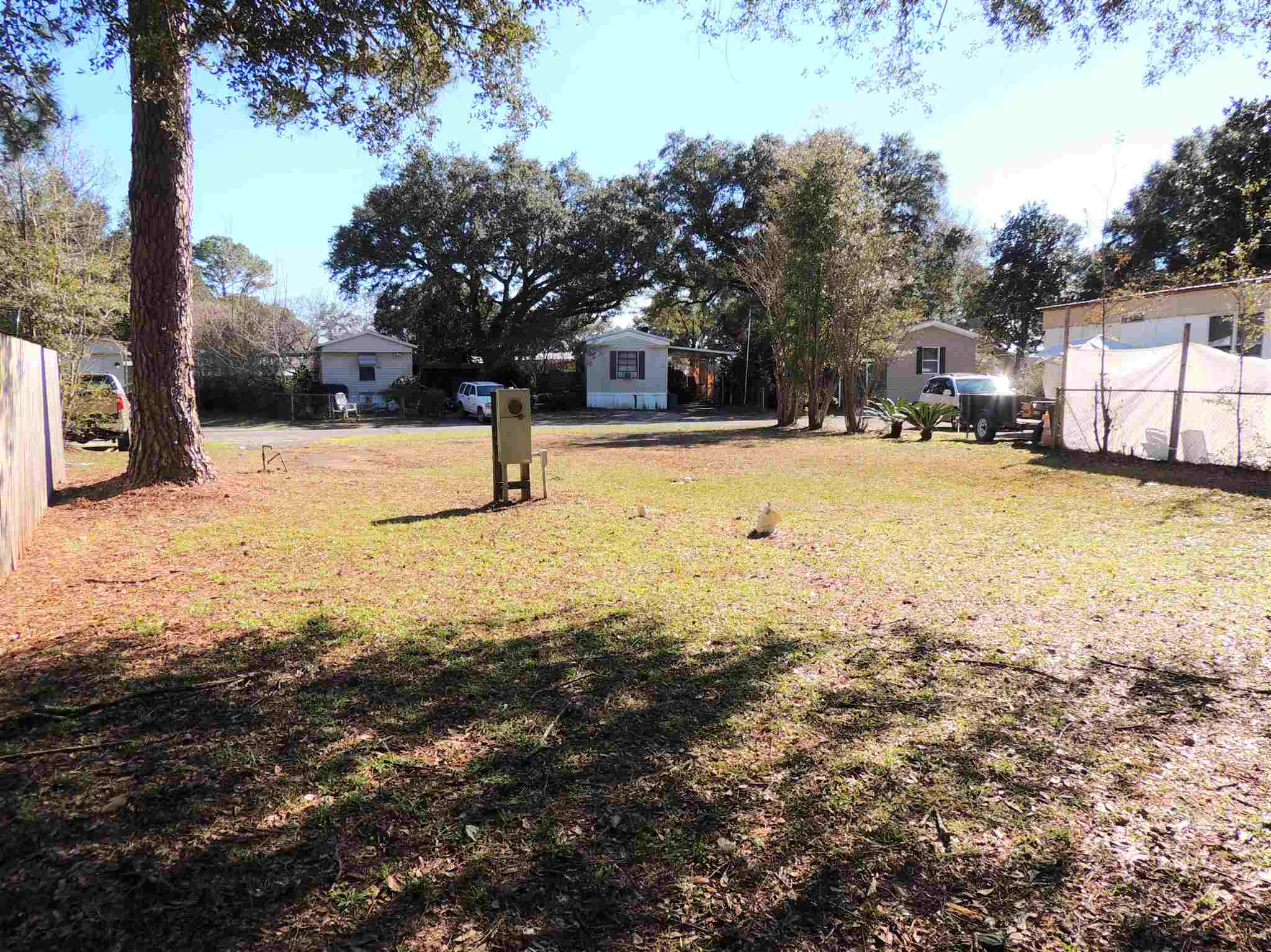 455 Mapleleaf Circle Pensacola, FL 32514 - Photo 3 of 11 a view of yard with trees