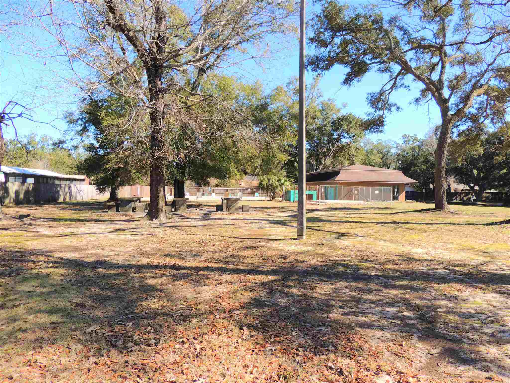 455 Mapleleaf Circle Pensacola, FL 32514 - Photo 4 of 11 a view of road with yard