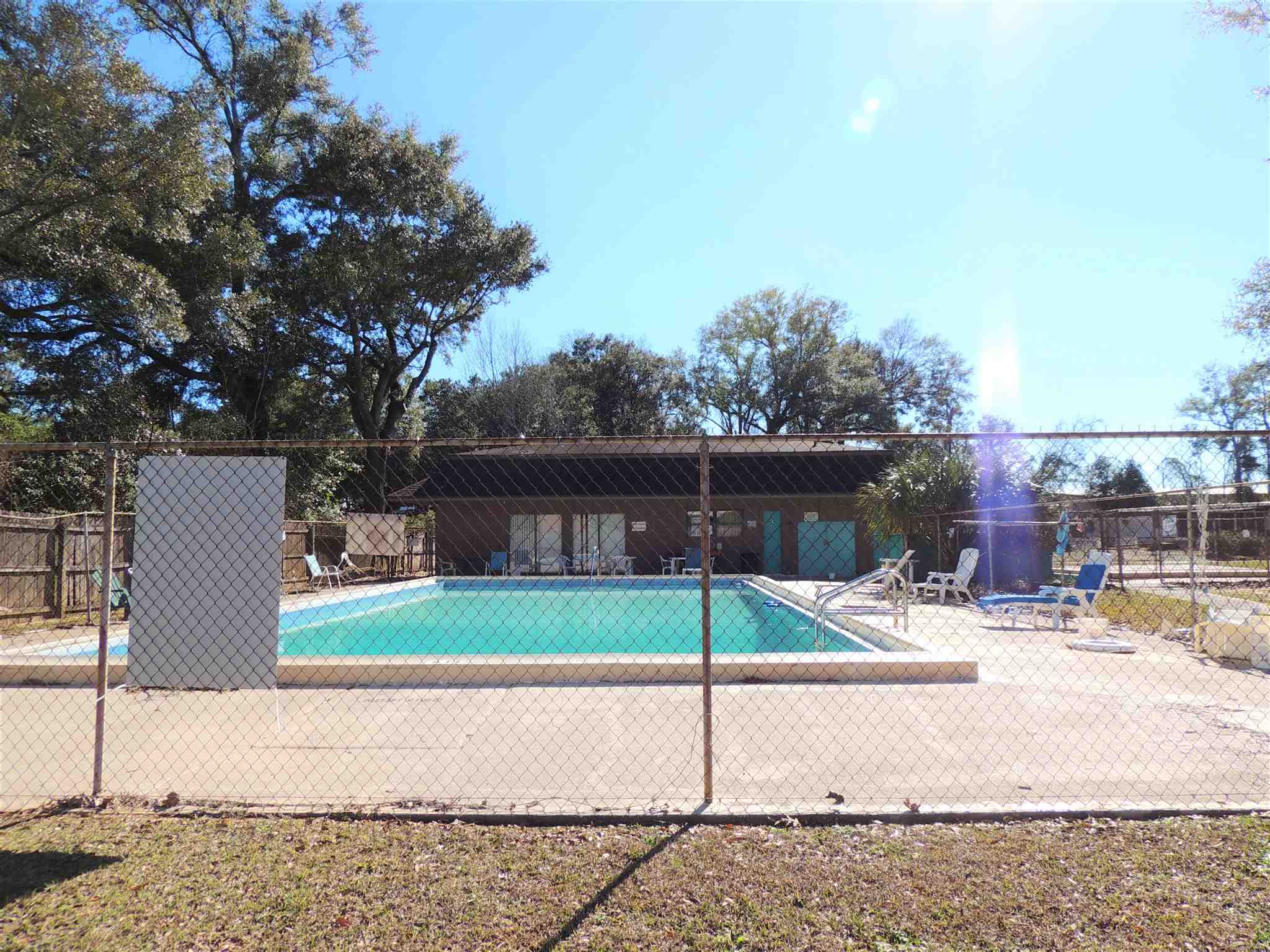 455 Mapleleaf Circle Pensacola, FL 32514 - Photo 6 of 11 a street view with patio