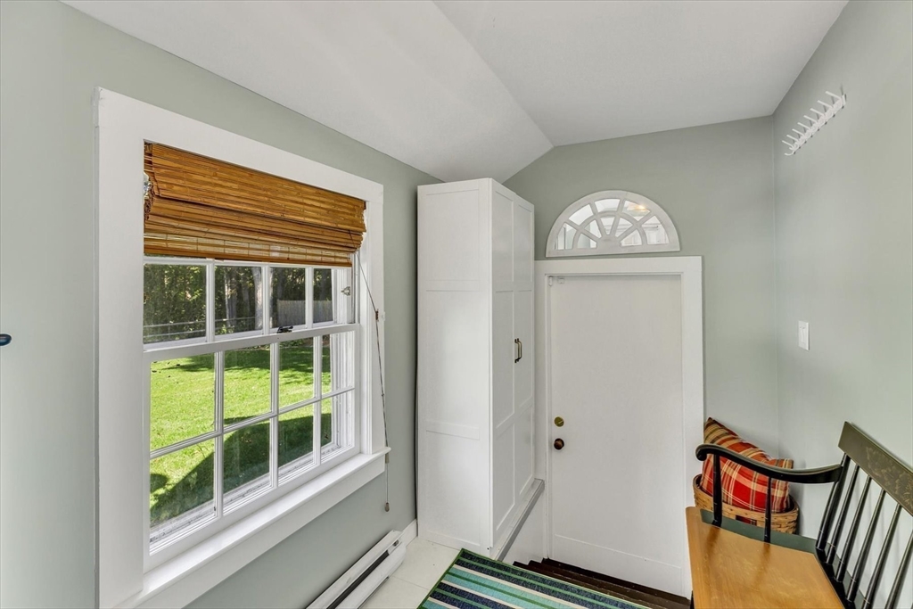 665 Route 6A Sandwich, MA 02537 - Photo 21 of 42 a view of an entryway with wooden floor
