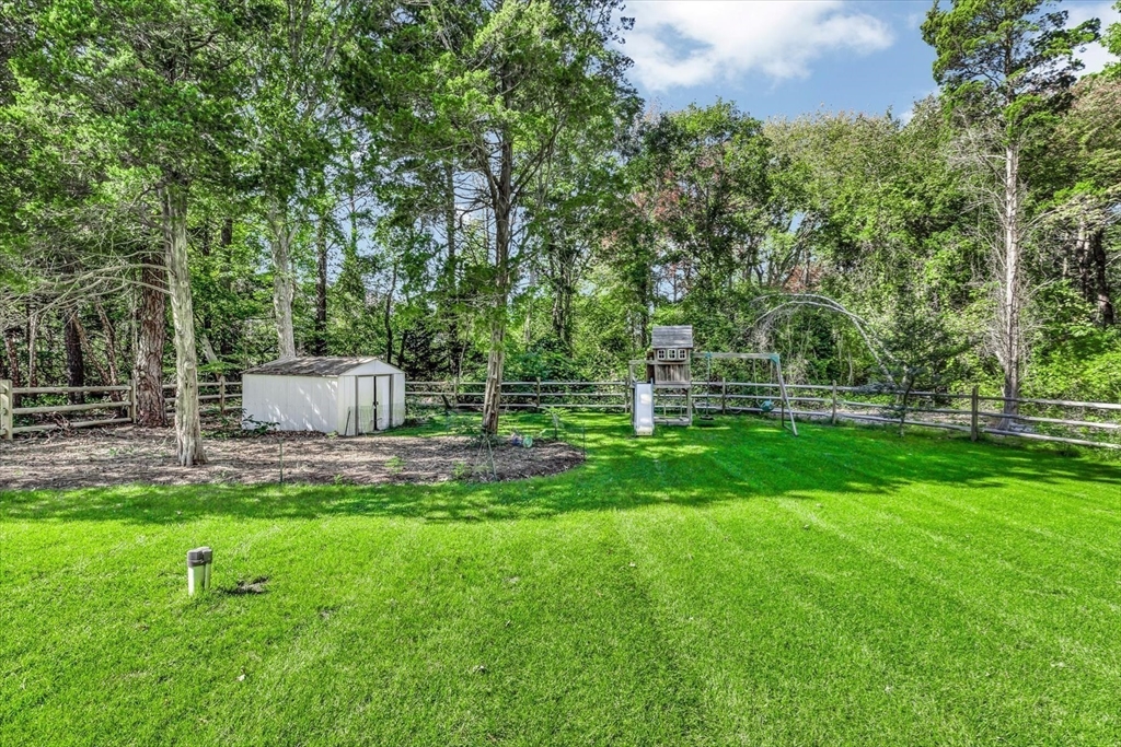 665 Route 6A Sandwich, MA 02537 - Photo 36 of 42 a garden view