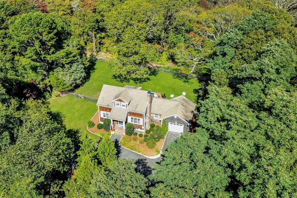 665 Route 6A Sandwich, MA 02537 - Photo 40 of 42 an aerial view of a house with a yard swimming pool