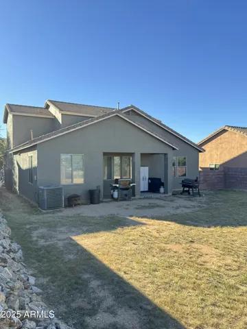 a view of a house with a swimming pool