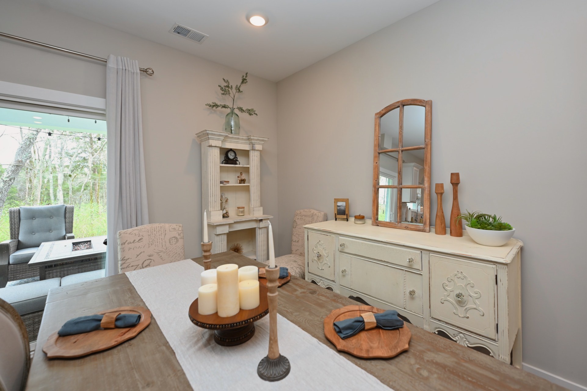 1144 Lock 4 Road, Unit J4 Gallatin, TN 37066 - Photo 14 of 39 a room with furniture a rug potted plant and a window