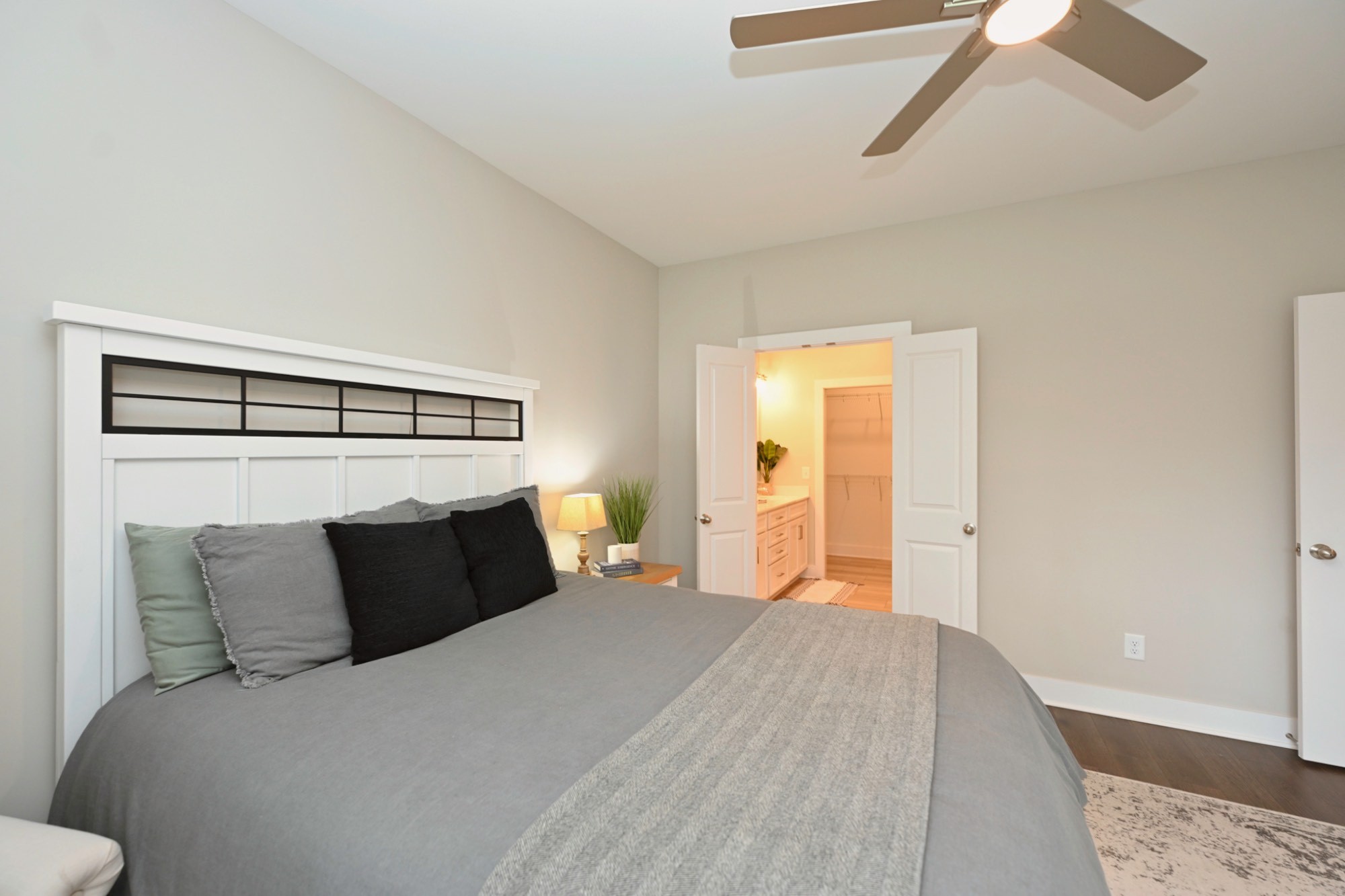 1144 Lock 4 Road, Unit J4 Gallatin, TN 37066 - Photo 18 of 39 a bedroom with a bed and a cabinets