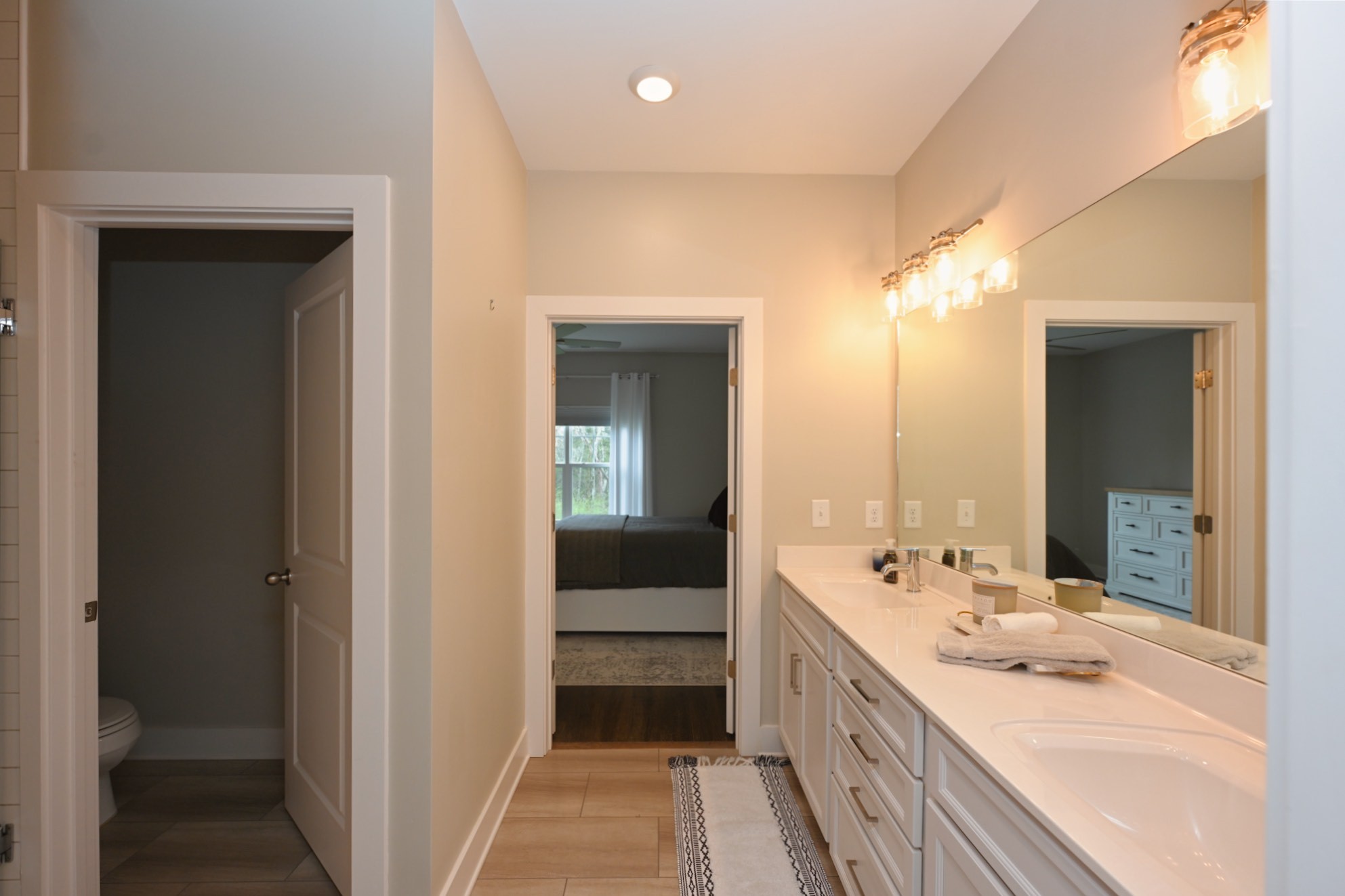 1144 Lock 4 Road, Unit J4 Gallatin, TN 37066 - Photo 23 of 39 a bathroom with a double vanity sink mirror and bathtub