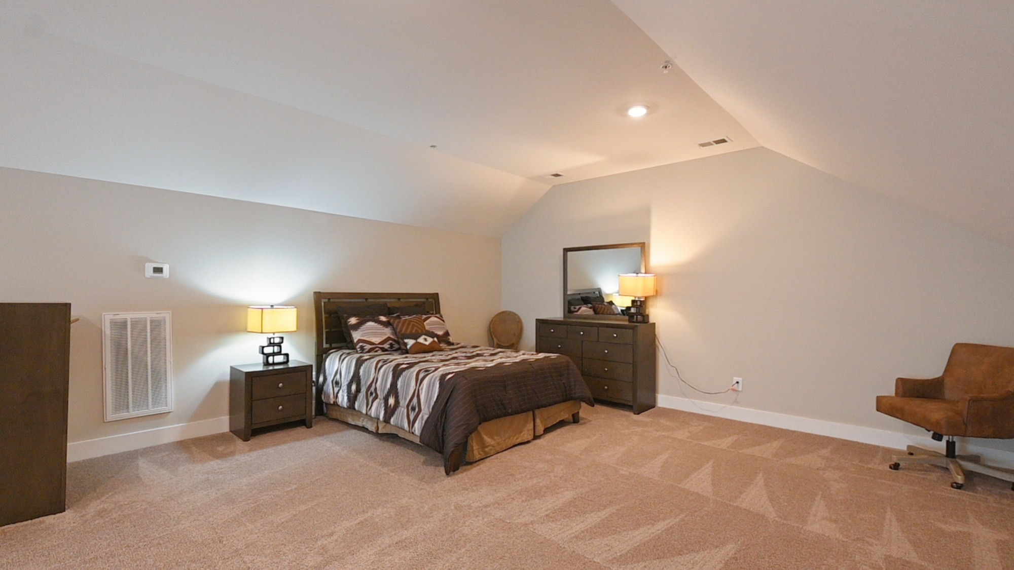 1144 Lock 4 Road, Unit J4 Gallatin, TN 37066 - Photo 29 of 39 a bedroom with a bed and a chair