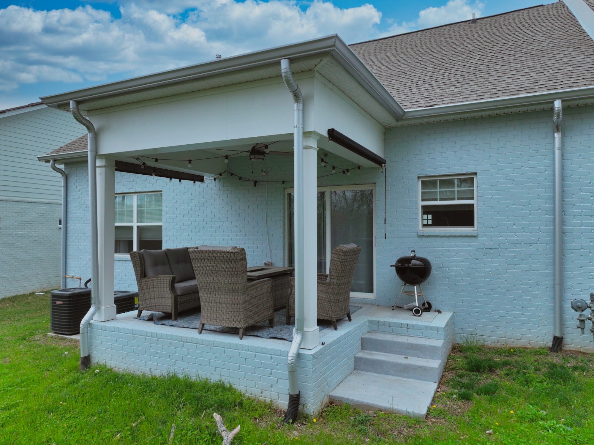 1144 Lock 4 Road, Unit J4 Gallatin, TN 37066 - Photo 33 of 39 a view of outdoor kitchen outdoor dining space and seating area