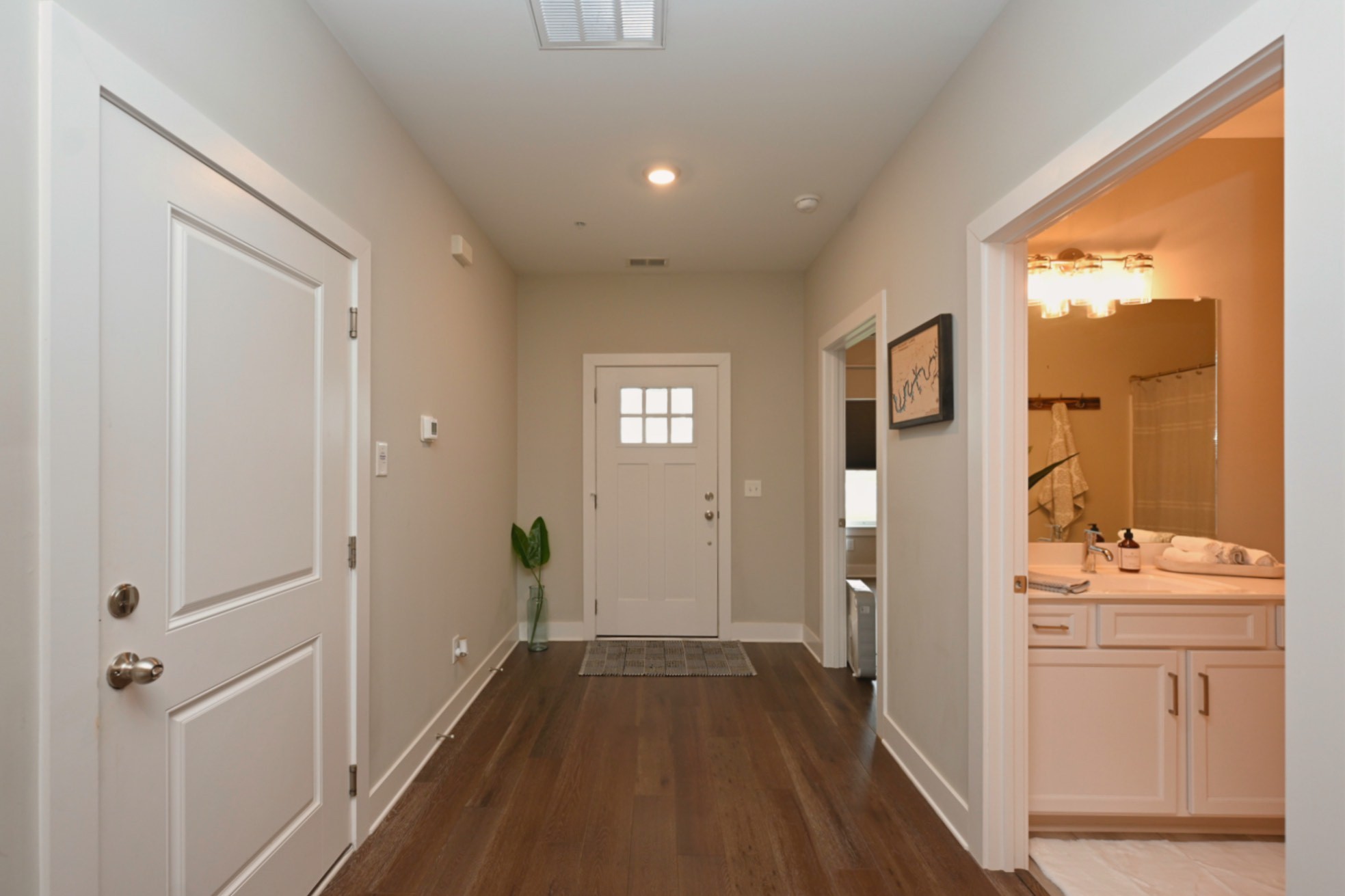 1144 Lock 4 Road, Unit J4 Gallatin, TN 37066 - Photo 4 of 39 a view of a hallway with closet and wooden floor