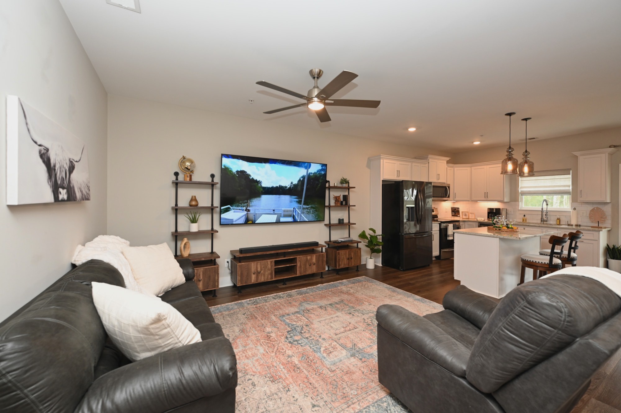 1144 Lock 4 Road, Unit J4 Gallatin, TN 37066 - Photo 7 of 39 a living room with furniture kitchen view and a wooden floor