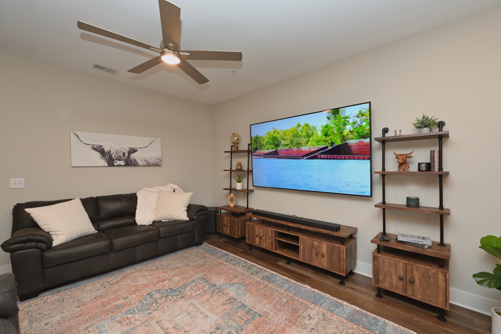 1144 Lock 4 Road, Unit J4 Gallatin, TN 37066 - Photo 8 of 39 a living room with furniture a flat screen tv and a lamp