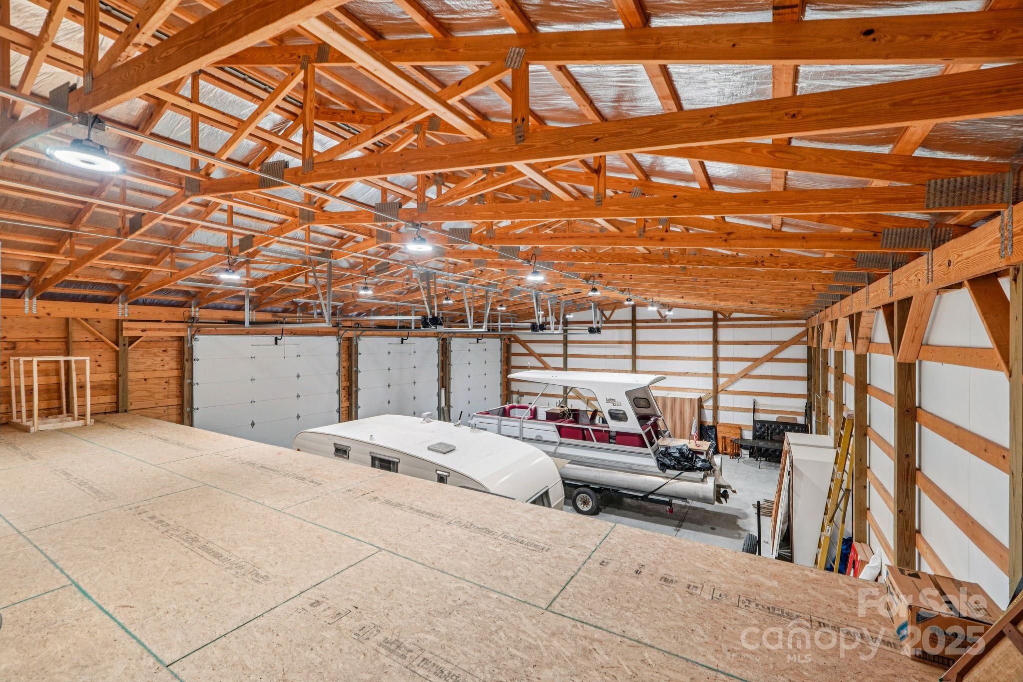 510 Lillys Bridge Road Mount Gilead, NC 27306 - Photo 12 of 18 a view of a car garage