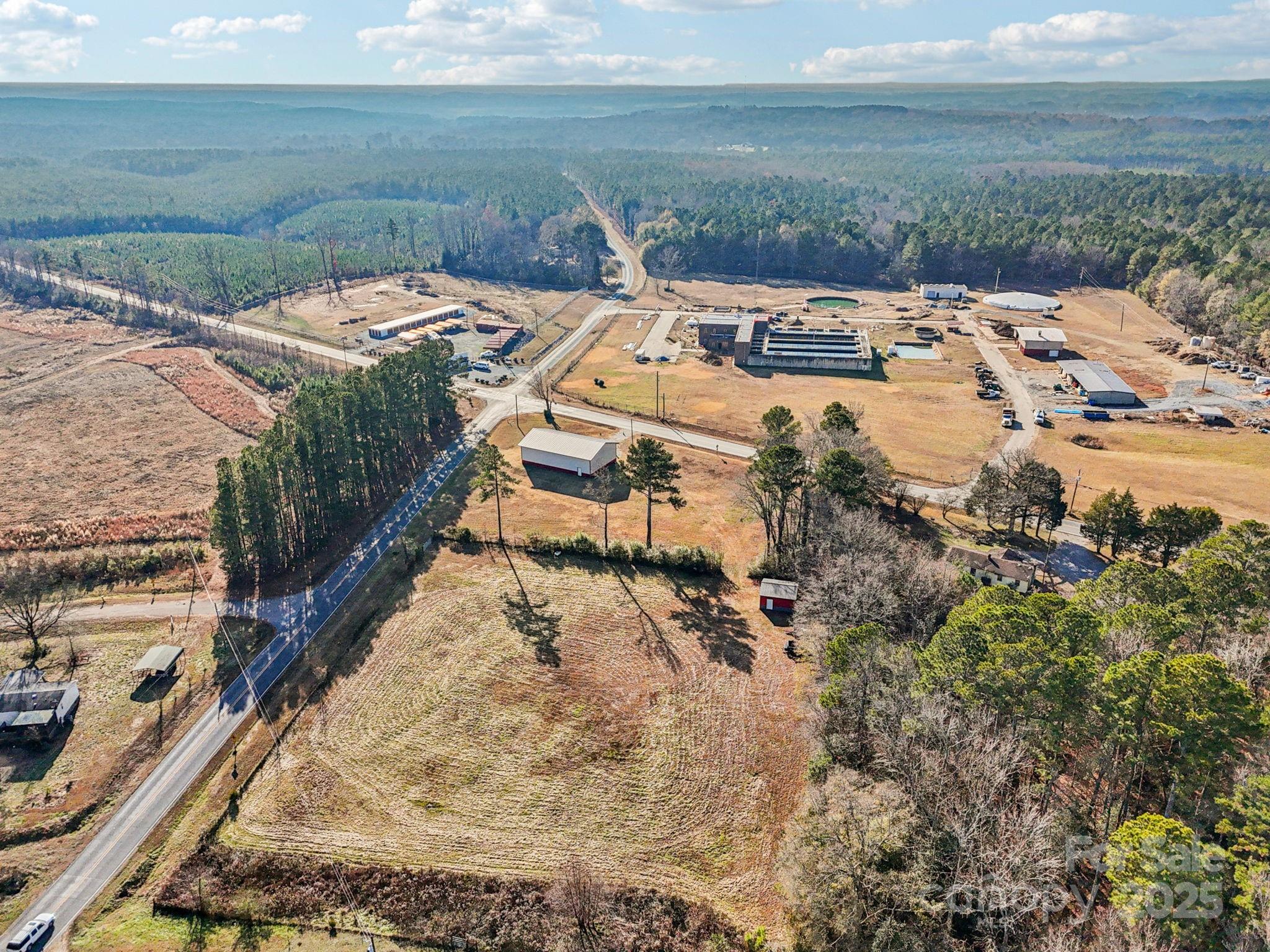 510 Lillys Bridge Road Mount Gilead, NC 27306 - Photo 3 of 18 a view of a yard with an outdoor space