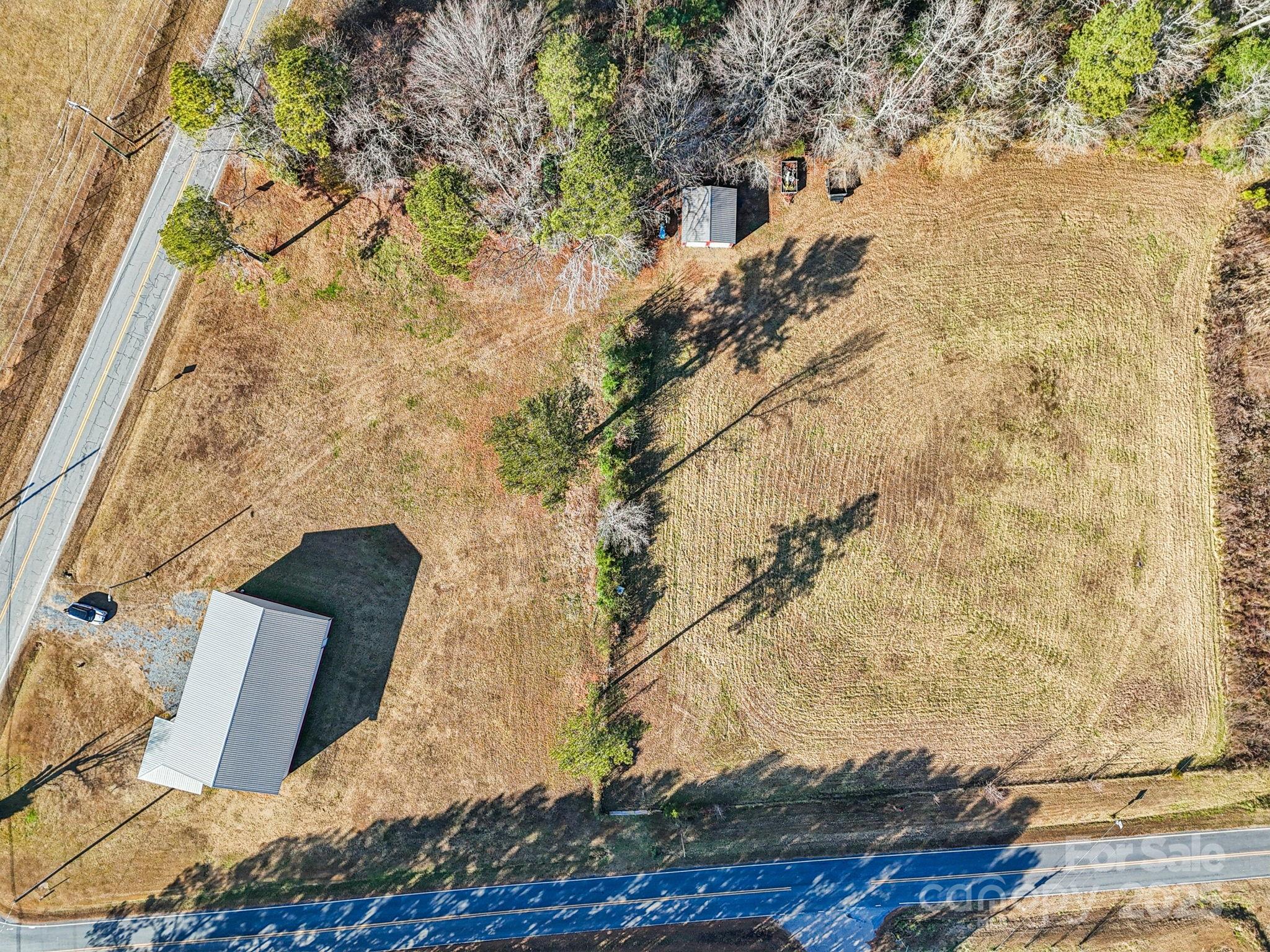 510 Lillys Bridge Road Mount Gilead, NC 27306 - Photo 6 of 18 a view of statue in a garden