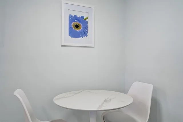 a bathroom with a toilet and a sink