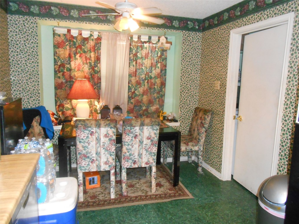 2811 Ashington Drive Houston, TX 77067 - Photo 6 of 9 a living room with furniture and a window