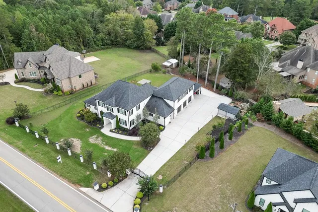 an aerial view of a house with garden