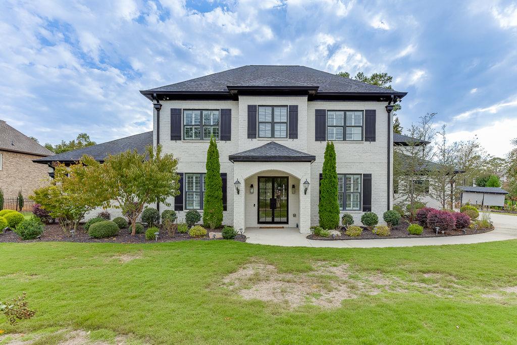 861 Bailey Woods Road Dacula, GA 30019 - Photo 2 of 67 a front view of a house with garden