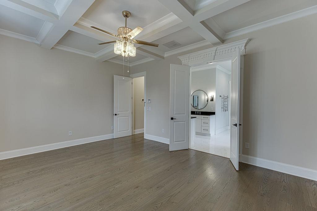 861 Bailey Woods Road Dacula, GA 30019 - Photo 25 of 67 wooden floor in an empty room with a window
