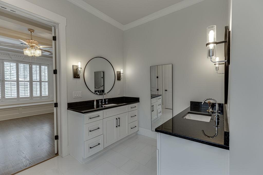 861 Bailey Woods Road Dacula, GA 30019 - Photo 28 of 67 a hallway with cabinets