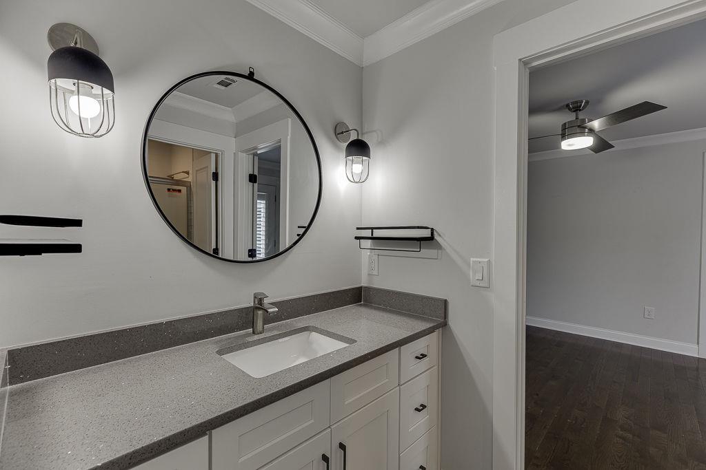 861 Bailey Woods Road Dacula, GA 30019 - Photo 51 of 67 a bathroom with a sink and a mirror