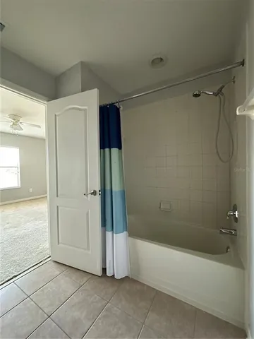a bathroom with a toilet sink and vanity