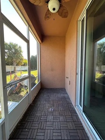 a view of a room with a large window