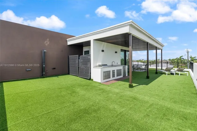 a view of a patio with a backyard
