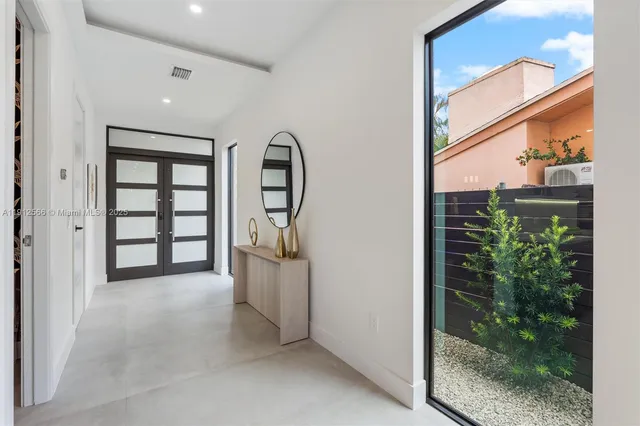 a bathroom with a toilet and a sink