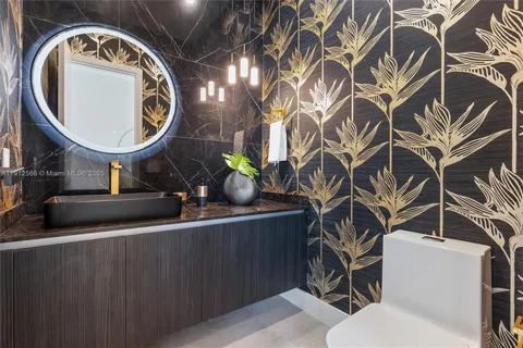 a spacious bedroom with a large bed and a large window