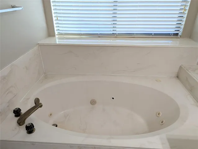 a bathroom with a tub