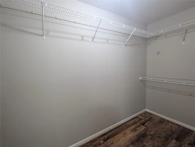 a view of a room with racks on the wall