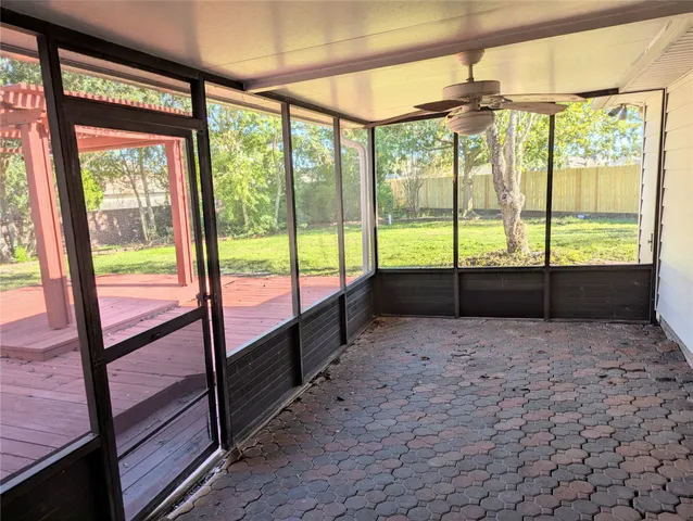 a view of an empty room and window