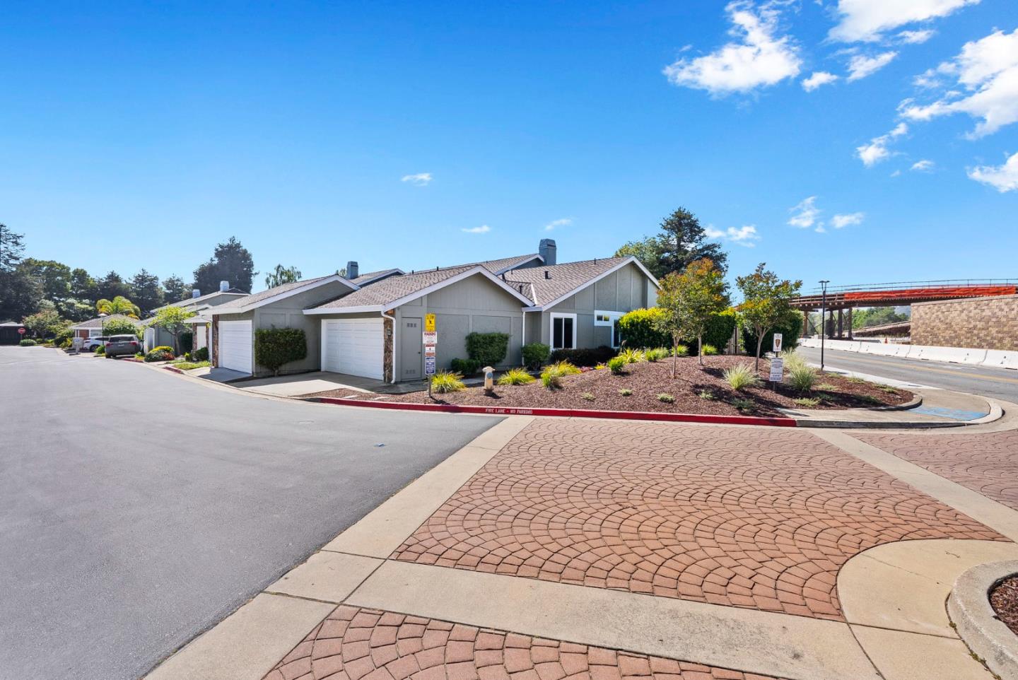 297 Perch Way Aptos, CA 95003 - Photo 1 of 42 a front view of a house with yard and parking